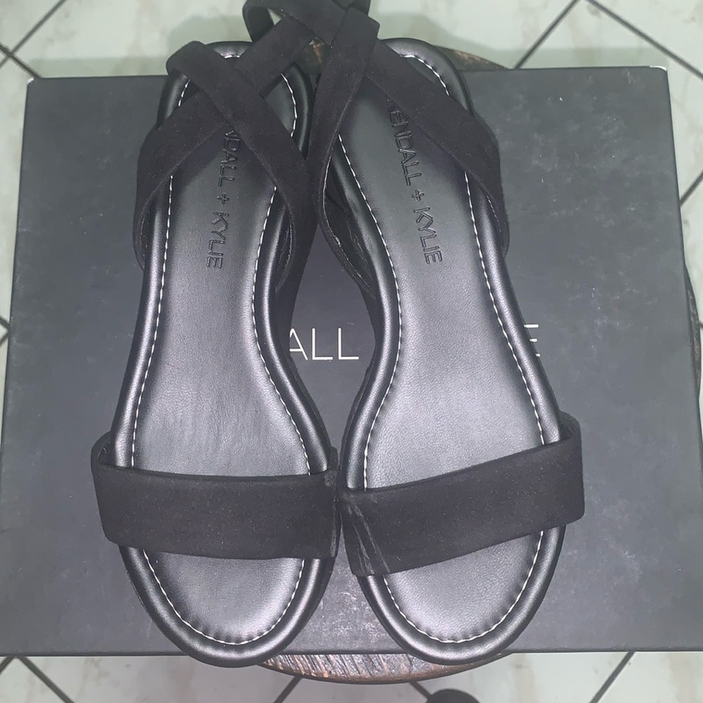 Kendall &. Kylie black strap open toe platform sandal in color black. Suede